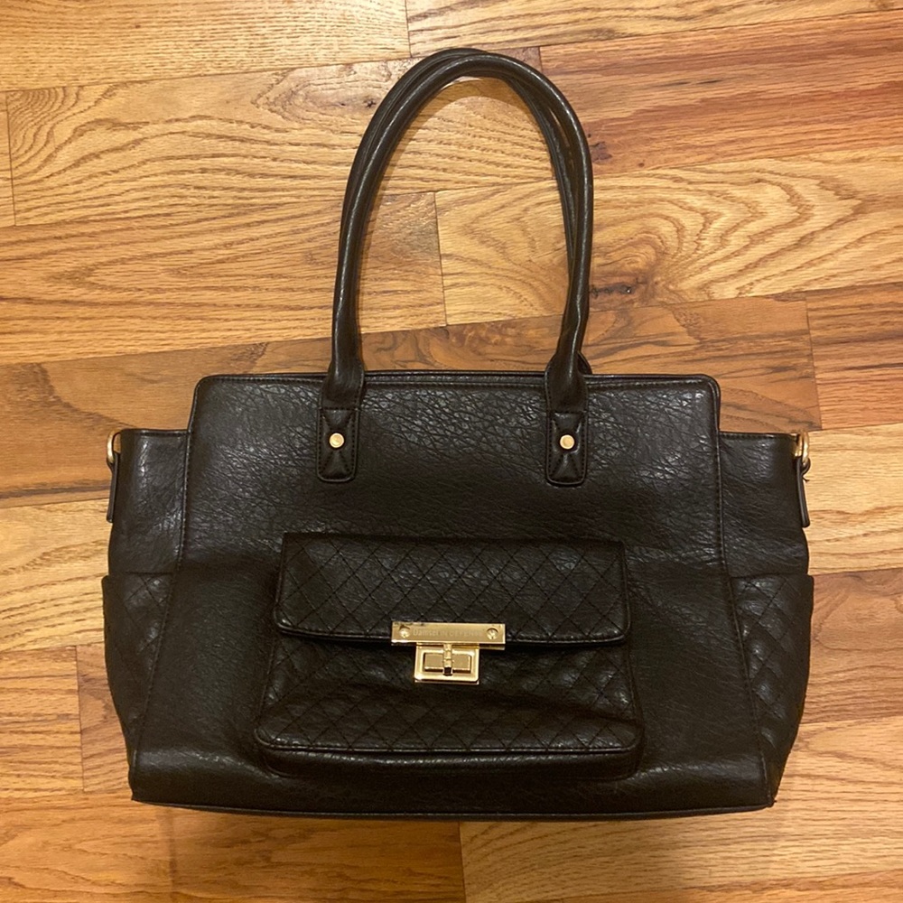 Damsel in defense purse, like new.